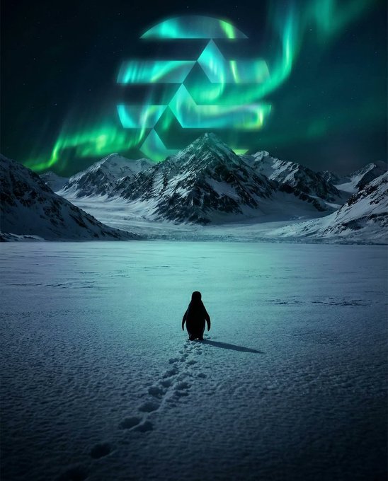 A small penguin walking across an icy landscape toward snow-capped mountains, with vibrant green aurora borealis lighting the sky and a glowing geometric logo composed of triangles in the clouds above.