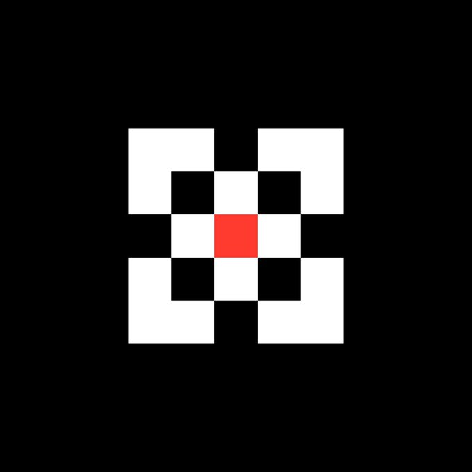 A symmetrical pixel art design featuring a red square in the center surrounded by white, black, and gray squares on a black background.