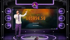 A game show set featuring a host in a purple suit gesturing toward a large digital display showing "LIST OF NEW 108856.50" with purple lighting and circular stage elements.