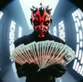 A person wearing a red and black Darth Maul mask holds open a fan of US dollar bills in what appears to be a sci-fi corridor.