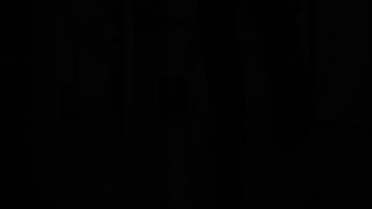 In the image, a single square photograph of a monochromatic black and white scene dominates the frame. The photograph appears old with a slightly faded quality that suggests its age or long-term exposure to light. The background of the photograph is dark and blurred, making it difficult to discern any specific details within it. The post caption contains a hashtag that indicates this photo may have been shared on social media platforms.