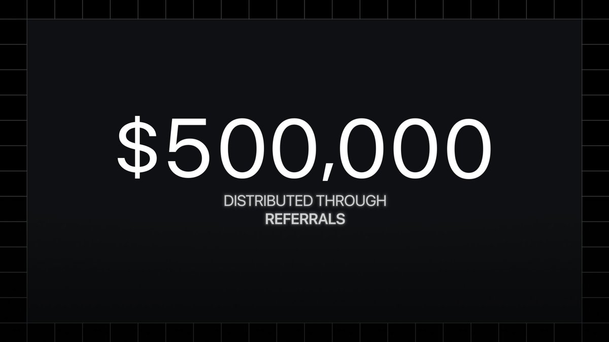 A black promotional graphic displaying '$500,000 DISTRIBUTED THROUGH REFERRALS' in white text.