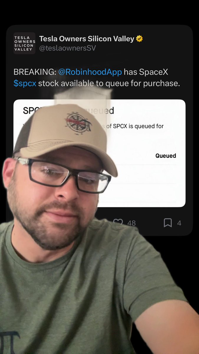 The image features a man wearing glasses, a green t-shirt, and a tan baseball cap with a logo. He has his arm around his neck and appears to be posing for a photo or video. The caption of the image reads "$SPCX stock available for que on @RobinhoodApp $TSLa ROADSTER SPOTTED?!!". This message is related to the post about Tesla Owners' Silicon Valley, as it mentions that SPCX stock is available and can be purchased through Robinhood App.
