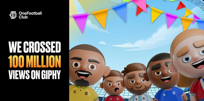 The image features a group of cartoon characters standing next to each other against a blue sky background with colorful flags flying above them. The text at the bottom of the image reads "We crossed 100,000,000 Views on @GIPHY! Started on June 13th 2025 Went from 0 to 100M within 349 days Most-watched GIF: 10,645,531 views OneFootball Heads and $OFC are ready to take over the #2021 World Cup." The characters appear to be in a celebratory mood as they look up at the sky.