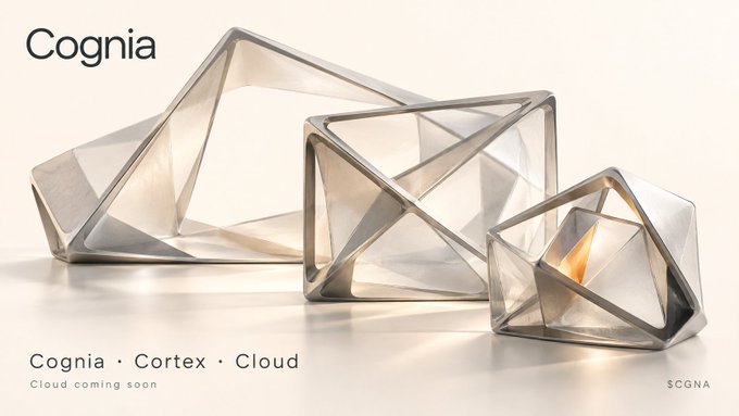 A promotional image for "Cognia" displaying three geometric, transparent triangular structures with metallic frames, accompanied by the text "Cognia • Cortex • Cloud" and "Cloud coming soon."