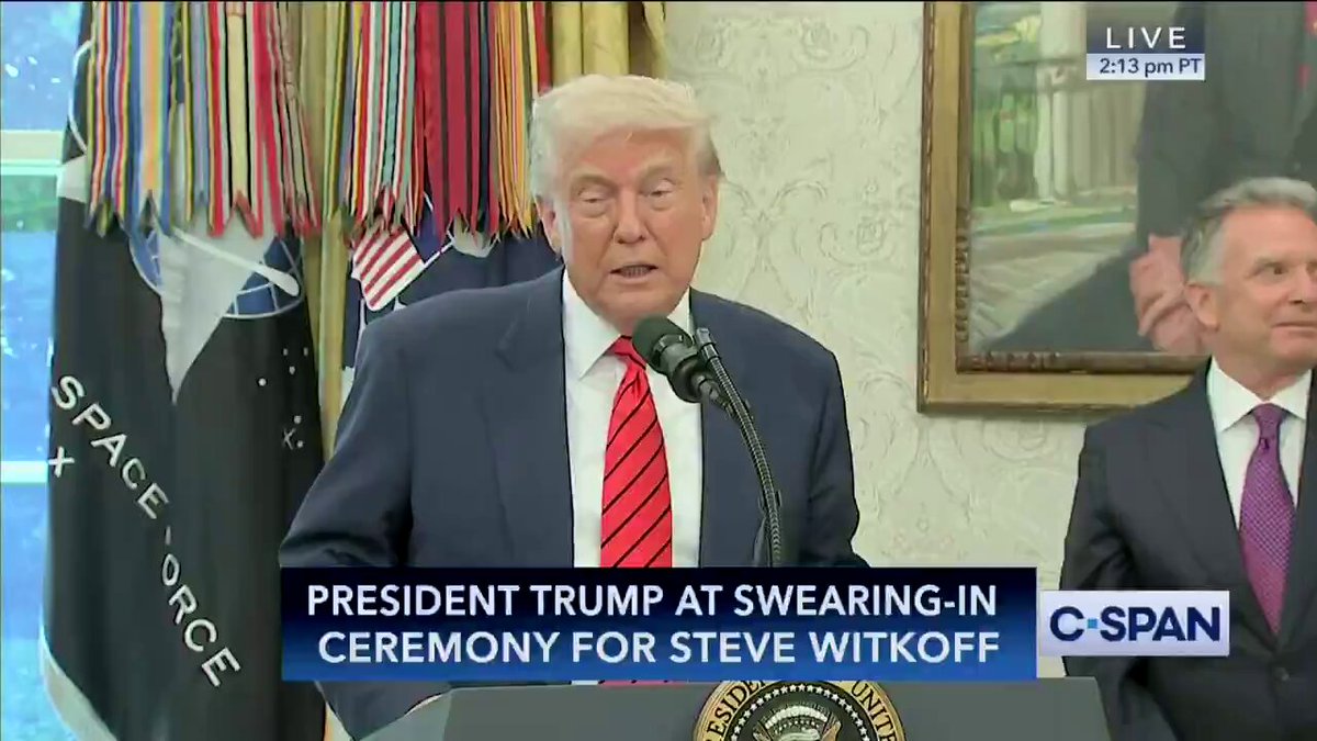 The image shows President Trump speaking at a podium with two men behind him, one wearing a tie as he speaks into a microphone. The photograph has a large caption stating "Boom! President Trump announces his new project for the country and its people".