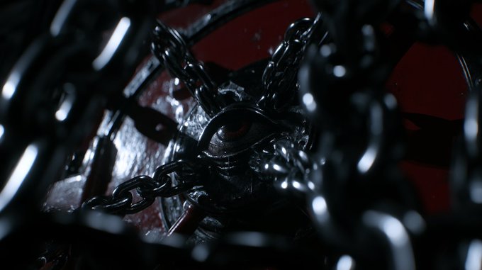 A close-up shot reveals a dark, sculpted figure with a single glowing red eye, wrapped tightly in heavy metal chains, partially obscured by chain links in the foreground. The image conveys a sense of ominous confinement, with the red background heightening the dramatic and unsettling mood, fitting for a "GN" (Good Night) post meant to evoke a haunting, sleepless atmosphere.