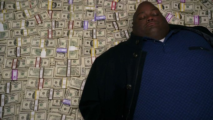 A man stands with eyes closed, leaning back confidently against a massive wall of stacked $50 and $100 bills bound in currency straps, embodying the post's bold claim of imminent billionaire status from Robinhood Chain's $1B Uniswap milestone.