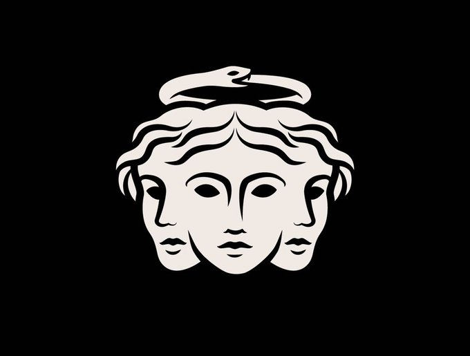 A stylized white and black graphic featuring three faces (a central larger face flanked by two smaller ones in profile) with wavy hair, resembling the Versace Medusa logo.