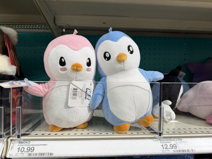 Two Pokémon Piplup plushies—a pink one and a blue one, with the blue tagged "Piplup"—sit on a Smoko and Squishmallows shelf priced at $10.99 and $12.99, likely a recent find celebrated in the post as the last ones available.