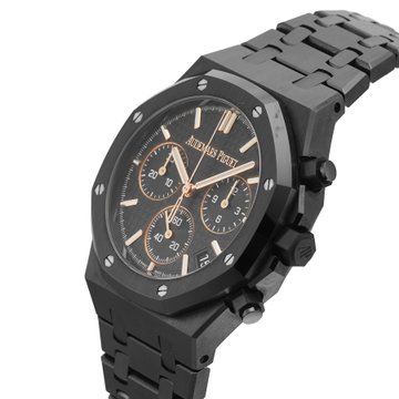 An image of a luxury Audemars Piguet Royal Oak Chronograph watch with a black dial, ceramic case, and matching bracelet, prominently displaying the "AUDEMARS PIGUET" branding on the face. The post uses this rare, high-value timepiece to illustrate that scarcity alone doesn't guarantee rising value, drawing a parallel to cryptocurrency's "21M coins" argument.