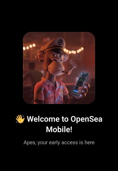 The image features a cartoon monkey holding a cell phone against a black background. The caption of the image reads "Welcome to OpenSea Mobile!". This suggests that the image is related to an advertisement for the mobile app, possibly promoting a new game or feature on the app.