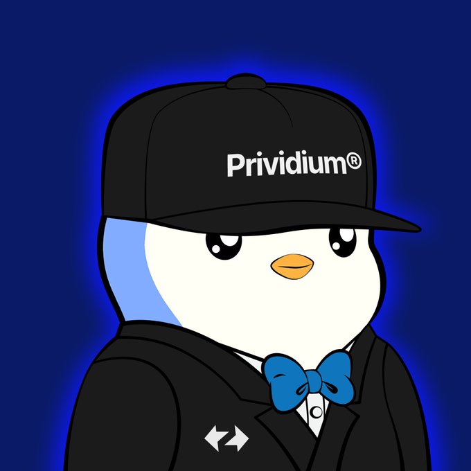 A cartoon penguin mascot wearing a black cap and suit jacket with a blue bow tie features the "Prividium®" logo on its cap, along with a small swap/exchange icon on the jacket—stylized as a cool, branded profile picture to match the "PFP your Pudgy Penguin season" caption.