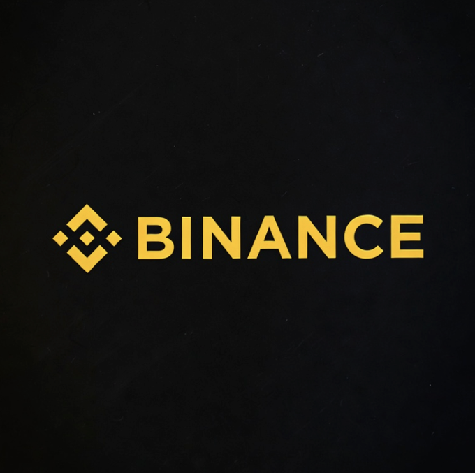 The image displays the Binance logo in gold on a black background, representing the cryptocurrency exchange mentioned in the post about Binance adjusting its commodity TradFi perpetual contracts to a 24/5 trading schedule starting September 15.
