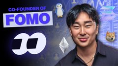 The image features a man wearing a black shirt smiling at the camera while surrounded by various objects such as a penguin, a snowman, and a dog. The background of the image has a blue color with white text that reads "execution speed is a game where you're never really satisfied." Below this text, there are two lines of code written in black text: one saying "@fomo" and another saying "@fomo @fomo". These lines of code seem to be related to the man's job or project.