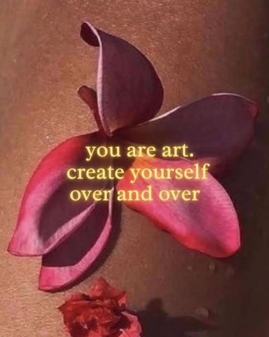 Motivational image showing a purple orchid flower with the yellow text overlay: 'you are art. create yourself over and over'.