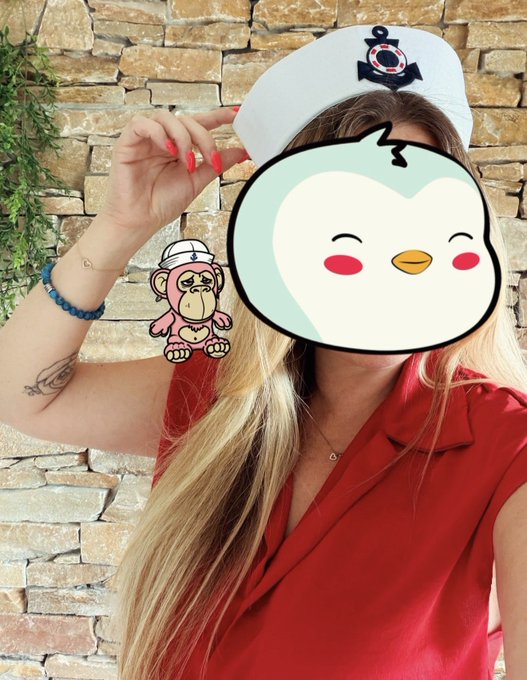 A woman in a red dress wearing a sailor cap, with her face obscured by a cute chick meme sticker and a small monkey cartoon overlay.