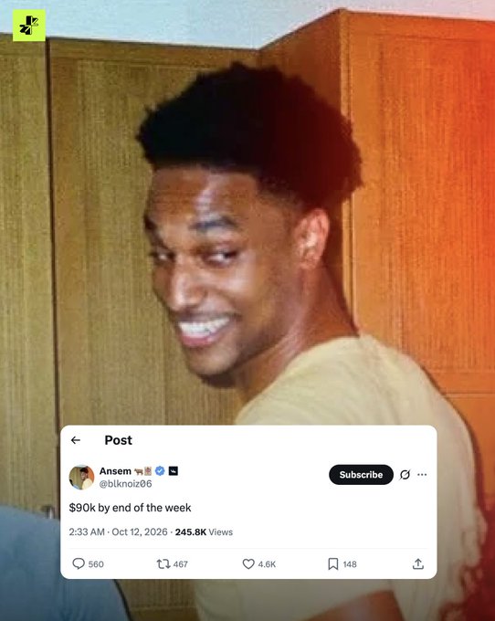 A young man smiling over his shoulder in what appears to be a viral social media post, with an overlaid tweet from user @blknolz06 (Ansem) reading '$90k by end of the week', dated Oct 12, 2026 with 245.8K views.