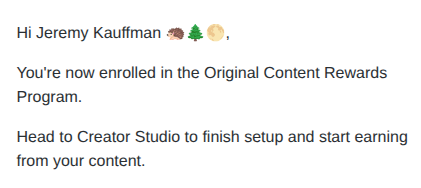 An email notification greeting 'Hi Jeremy Kauffman' with leaf and cookie emojis, announcing enrollment in the Original Content Rewards Program and directing him to Creator Studio for setup.