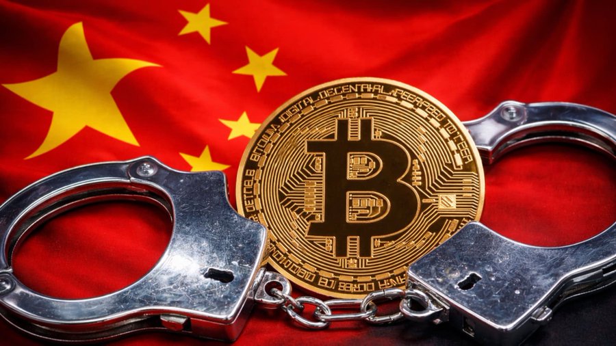 A golden Bitcoin rests between a pair of silver handcuffs against the backdrop of the Chinese flag, visually symbolizing cryptocurrency's role as a geopolitical tool constraining China. The coin's inscription "BITCOIN DIGITAL DECENTRALIZED PEER TO PEER" reinforces the theme of decentralized finance being wielded as a strategic weapon.