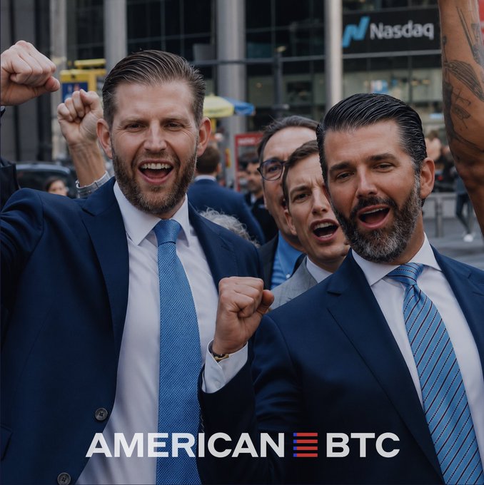 Eric Trump and Donald Trump Jr. celebrate outside the Nasdaq building in suits with raised fists, celebrating American Bitcoin (ABTC) following BTIG's Buy rating with a $15 price target and 88%+ implied upside. The "AMERICAN BTC" logo is displayed at the bottom, tying the triumphant moment to the company's recent bullish analyst coverage.