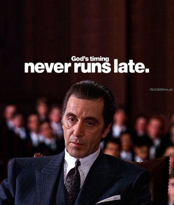 A meme featuring Al Pacino in a suit, with overlaid text reading "God's timing never runs late." and a watermark "FB/JOKERAttitude".