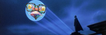 The image features a cartoon character, likely a frog or a lizard, wearing glasses with a blue background and a white border. The character appears to be floating in space above a city skyline at night. Below the character, there's a banner photo that reads "@ribbita2012" along with some text about Batman and Robin.