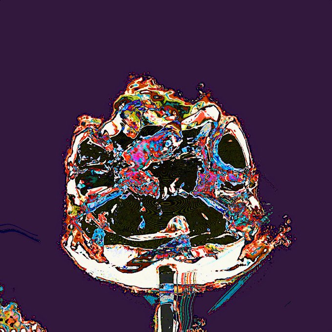 A heavily distorted, psychedelic digital image with glitch-like, multicolored chaotic patterns against a solid purple background.