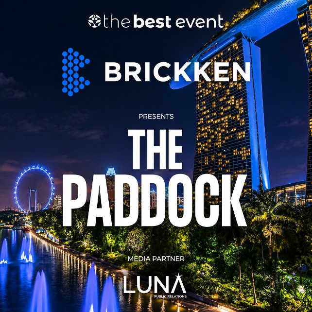 A promotional graphic for an event titled 'BRICKKEN PRESENTS THE PADDOCK' with 'the best event' and 'LUNA PUBLIC RELATIONS' as media partner, set against a nighttime cityscape featuring the Singapore Flyer and Marina Bay Sands.