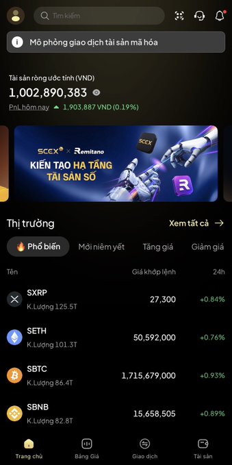 A Vietnamese cryptocurrency exchange app interface displaying a virtual asset balance of 1,002,890,383 VND with a list of trending tokens including SXRP, SETH, SBTC, and SBNB with their respective prices.