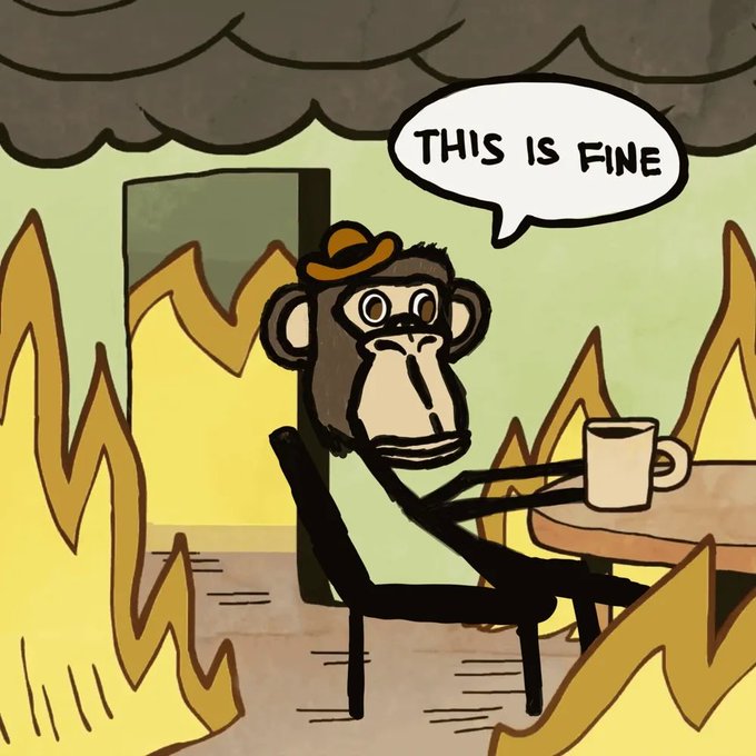 A cartoon monkey wearing a hat sits calmly at a table holding a coffee mug while flames engulf the room, saying "THIS IS FINE." The image humorously relates to the post by depicting the NFT market as an uncontrollable fire, while the monkey's forced calm mimics collectors who continue flipping NFTs despite the chaos they're creating by hoarding supply and blocking genuine artist discovery.