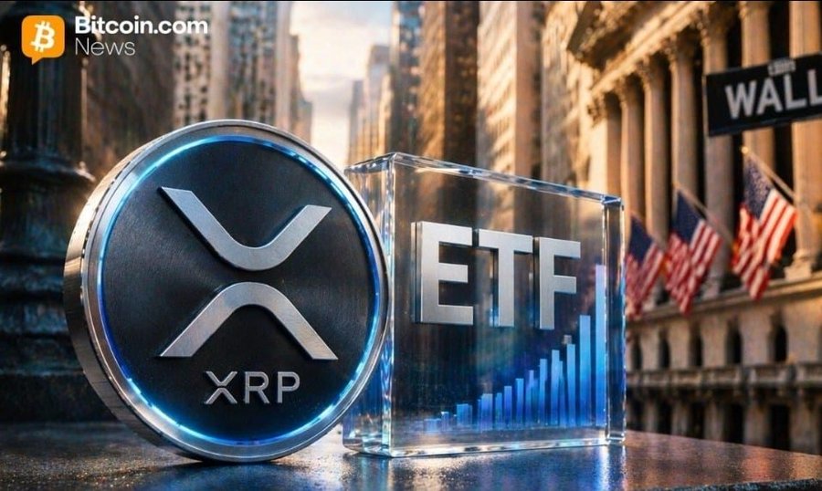 A Bitcoin.com News graphic showing an XRP coin and a transparent cube labeled 'ETF' with an upward chart, set against a Wall Street building backdrop with American flags.