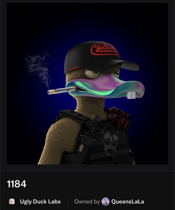A 3D-rendered anthropomorphic duck wearing a black "Von Dutch" cap and a tactical vest labeled "UDS" smokes a cigarette against a dark blue background, representing the 1184th NFT minted in the "Ugly Duck Labs" collection owned by QueensLaLa. The image visually ties to the caption by showcasing the UDS badge that the mentioned legends (HempMillionaire and NotRealCashper) proudly rock in the Ugly Duck Society community.