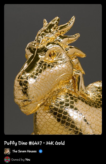 A glossy gold 3D sculpture titled 'Puffy Dino #6427 · 24K Gold' created by 'The Seven Houses' is shown, marked as 'Owned by You.'