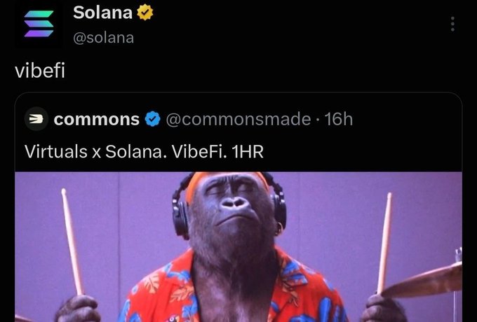 The image shows a tweet from Solana (@solana) replying "vibefi" to a post by commons (@commonsmade) announcing "Virtuals x Solana. VibeFi. 1HR," featuring a humorous photo of a gorilla wearing headphones and holding drumsticks as if playing music. The meme-style imagery and crypto project references in both the tweet and the accompanying bullish comment about $ANSEM suggest the post is using the scene to playfully hype Solana-related crypto opportunities and community FOMO around virtual music/NFT projects.