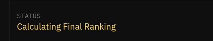A dark screen displaying the text "STATUS" and "Calculating Final Ranking".