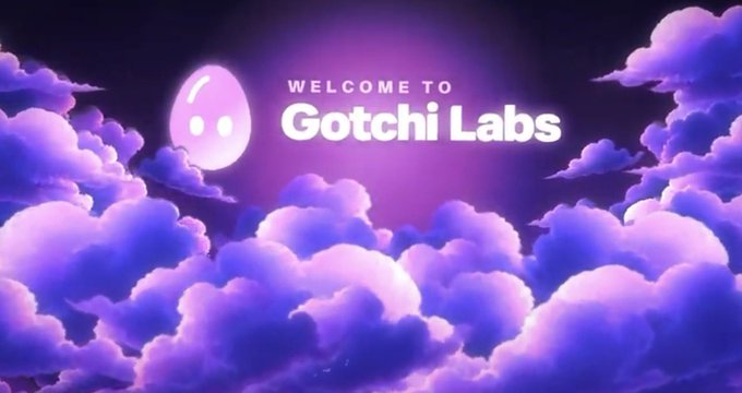 A purple-themed welcome banner reading 'WELCOME TO Gotchi Labs' featuring a cute pink ghost-like character floating among stylized purple clouds.