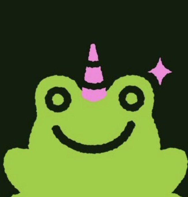 A cute green frog character with a pink unicorn horn and smiley face on a dark background.