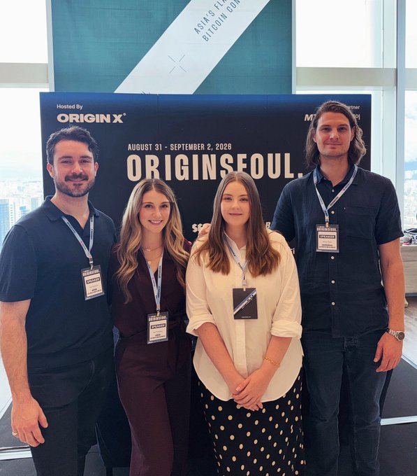 Four attendees pose together at "ORIGINSEOUL," hosted by ORIGINX from August 31 - September 2, 2028, with "ASIA'S FLAGSHIP BITCOIN CONFERENCE" visible in the background—capturing the team's experience at the Bitcoin conference in Seoul, as referenced in the caption about spending time with the @_checkonchain crew.