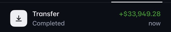 A screenshot of a digital payment or banking notification indicating a 'Transfer Completed' for the amount of '+$33,949.28' displayed in green text.