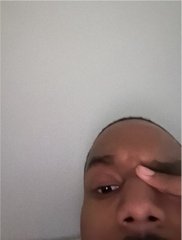 A close-up selfie of a man with his finger pressed against his temple, seemingly in thought, set against a plain gray background. The image appears to reflect the post's message of confidence and reassurance for $ANSEM holders, suggesting a "stay strong and keep believing" sentiment.
