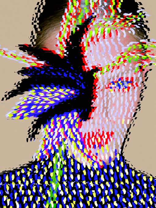 A heavily distorted, glitch-style digital portrait featuring fragmented pixels in red, blue, green, and white over a beige background.
