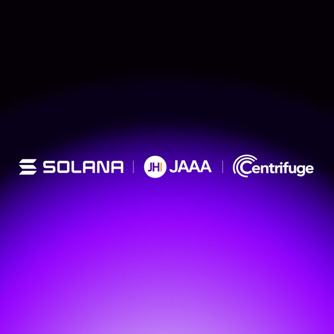 The image features a purple background with white text that reads "Solana Centrifuge". This suggests that the image might be related to Solana, a company known for its cryptocurrency platform called Solana. The other three words on the right side of the image are "JAAA", "Centrifuge", and "Centrifuges". These words could potentially be part of a promotional campaign or a description of the company's services related to cryptocurrencies.