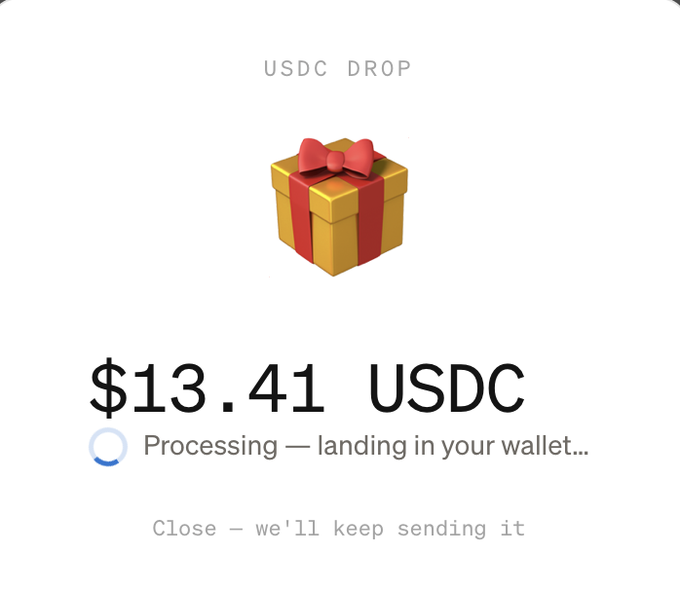 A USDC DROP notification showing a gift box icon and $13.41 USDC processing with the message 'landing in your wallet...' and 'Close — we'll keep sending it.'
