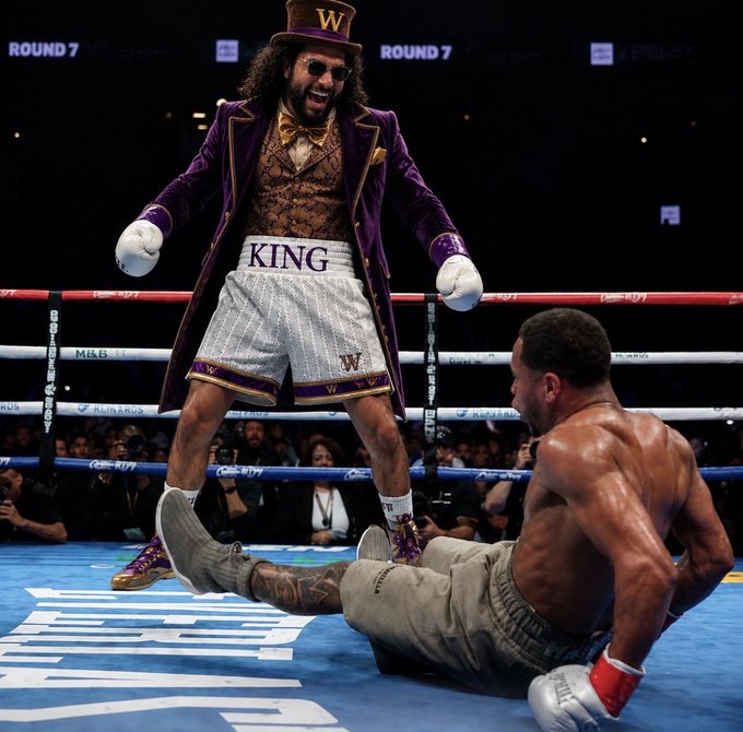 A man in a flamboyant purple top hat and "KING" boxing shorts stands triumphantly over a fallen opponent in a boxing ring, with "ROUND 7" displayed in the background, symbolizing a crushing victory. The image humorously relates to the post's boast about "fading the VOID," portraying the user as a confident winner dominating the market.