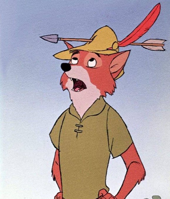 An animated cartoon fox character wearing a tan hat with a feather and arrow through it, along with a green tunic, appearing surprised with its mouth open.