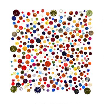 An organized grid of numerous colorful vintage-style buttons arranged in rows and columns.