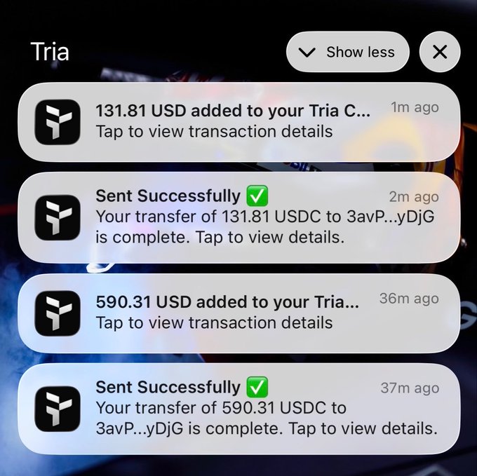 A smartphone screen showing Tria app notifications for USDC transactions, including a successful transfer of 131.81 USDC to address starting with 3avP...yDjG.