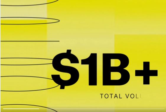 A graphic with a bright yellow background displays the bold black text '$1B+' and 'TOTAL VOLUME' with swirling line designs on the left side.