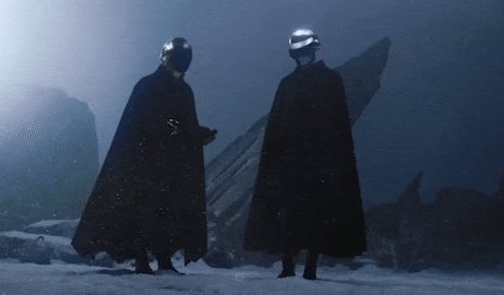 iced coffee and a black umbrella are present, with the person holding it standing on a rocky outcropping against a dark sky.